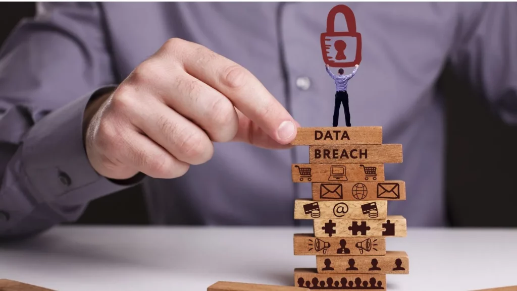 The concept of technology, the Internet and the network. Businessman shows a working model of business: Data breach